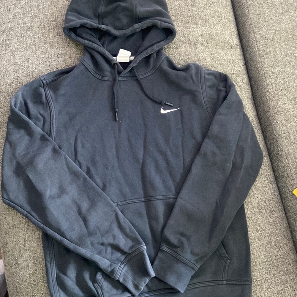 Black Nike hoodie, size medium.